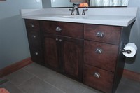 Thumb vanity  craftsman style  hard maple  dark color  recessed panel  single sink  bank of 3 drawers