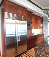 Thumb kitchen  contemporary style  sapele  medium color  recessed panel  appliance garage with top pocket door  full overlay