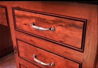 Thumb kitchen  traditional style  knotty cherry  cherry color  glazed  slab drawer fronts  flush mount detail
