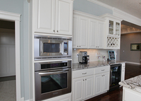 Thumb kitchen  traditional style  painted  raised panel  staggered heights  wine rack  glass door  standard overlay